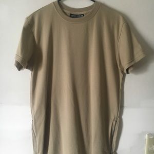 Elongated T-shirt with zipper on sides.